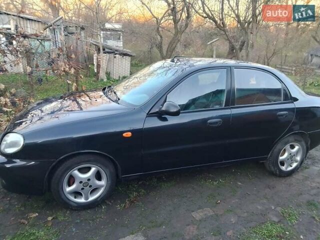 Черный Дэу Ланос, объемом двигателя 1.5 л и пробегом 256 тыс. км за 1850 $, фото 11 на Automoto.ua