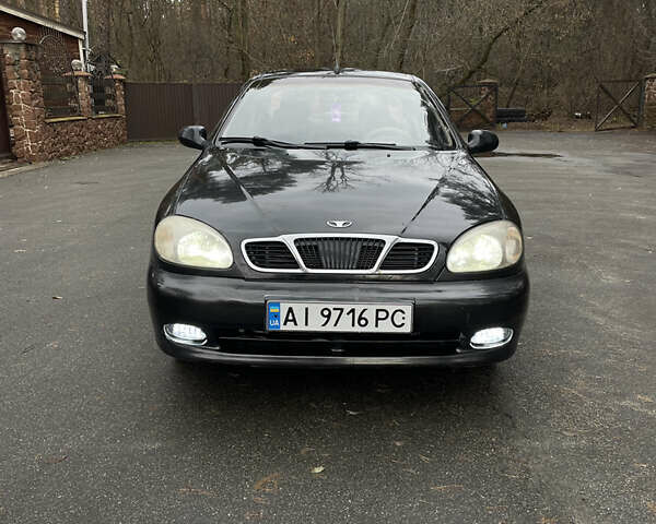 Черный Дэу Ланос, объемом двигателя 1.5 л и пробегом 198 тыс. км за 2199 $, фото 1 на Automoto.ua