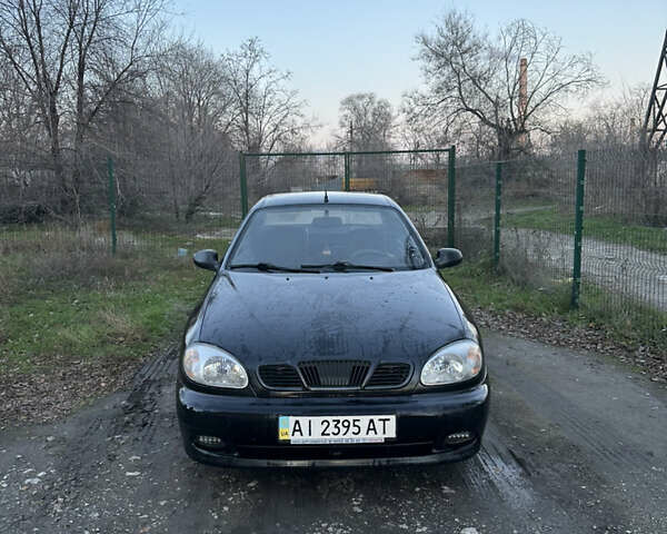 Черный Дэу Ланос, объемом двигателя 1.5 л и пробегом 270 тыс. км за 1900 $, фото 2 на Automoto.ua