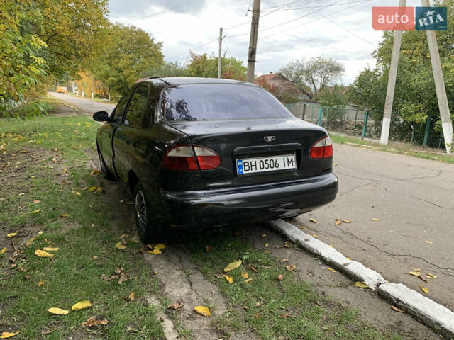 Черный Дэу Ланос, объемом двигателя 1.5 л и пробегом 263 тыс. км за 1830 $, фото 2 на Automoto.ua