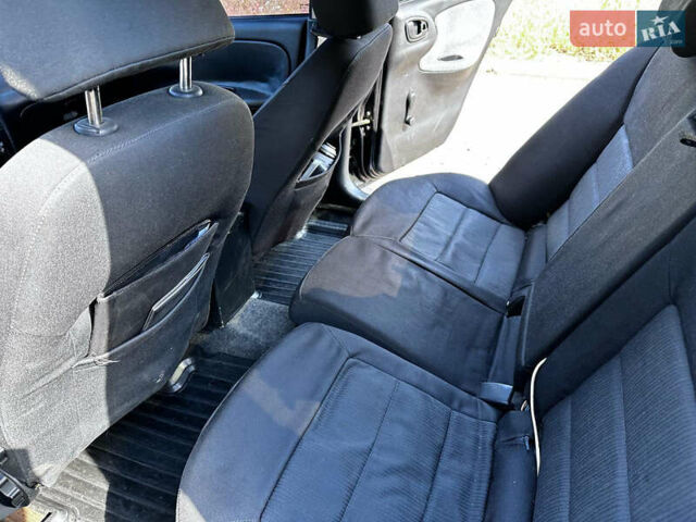 Черный Дэу Ланос, объемом двигателя 1.5 л и пробегом 220 тыс. км за 3100 $, фото 18 на Automoto.ua