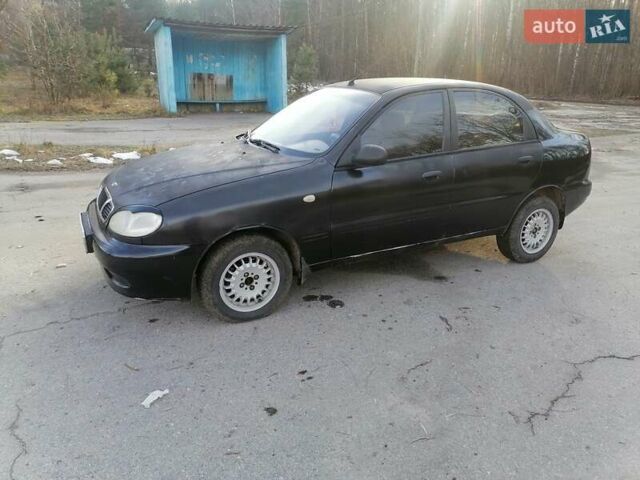 Черный Дэу Ланос, объемом двигателя 1.5 л и пробегом 300 тыс. км за 1650 $, фото 1 на Automoto.ua