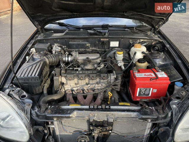 Черный Дэу Ланос, объемом двигателя 1.5 л и пробегом 198 тыс. км за 2199 $, фото 13 на Automoto.ua