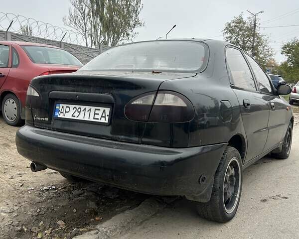 Черный Дэу Ланос, объемом двигателя 1.5 л и пробегом 225 тыс. км за 1200 $, фото 4 на Automoto.ua