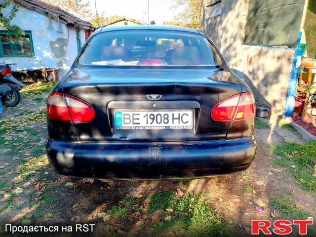 Черный Дэу Ланос, объемом двигателя 1.5 л и пробегом 247 тыс. км за 2100 $, фото 6 на Automoto.ua