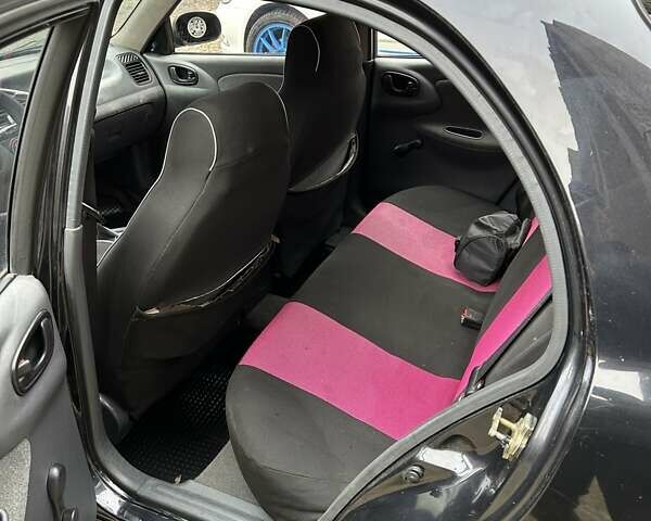 Чорний Деу Ланос, об'ємом двигуна 1.5 л та пробігом 222 тис. км за 1800 $, фото 18 на Automoto.ua