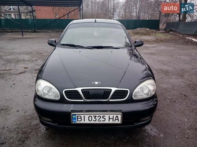 Черный Дэу Ланос, объемом двигателя 1.35 л и пробегом 122 тыс. км за 1699 $, фото 1 на Automoto.ua