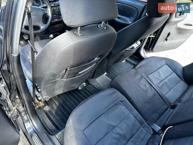 Черный Дэу Ланос, объемом двигателя 1.5 л и пробегом 220 тыс. км за 3100 $, фото 17 на Automoto.ua