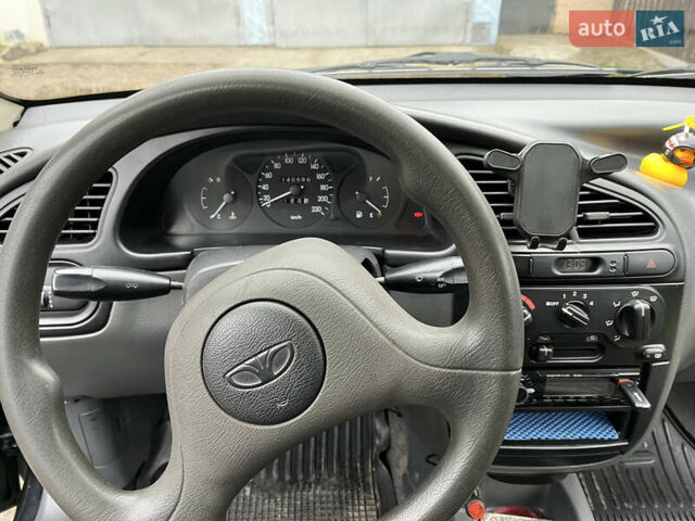 Черный Дэу Ланос, объемом двигателя 1.5 л и пробегом 140 тыс. км за 2500 $, фото 17 на Automoto.ua