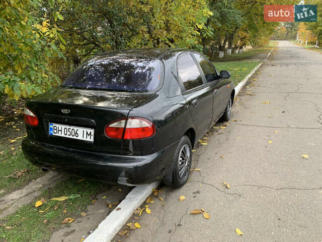 Черный Дэу Ланос, объемом двигателя 1.5 л и пробегом 263 тыс. км за 1830 $, фото 3 на Automoto.ua