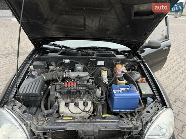Черный Дэу Ланос, объемом двигателя 1.5 л и пробегом 251 тыс. км за 2550 $, фото 11 на Automoto.ua