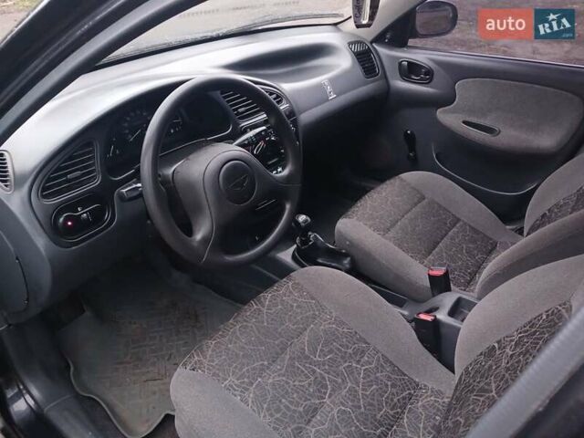 Черный Дэу Ланос, объемом двигателя 1.35 л и пробегом 122 тыс. км за 1699 $, фото 6 на Automoto.ua
