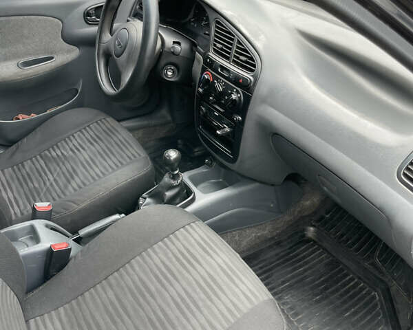 Черный Дэу Ланос, объемом двигателя 1.5 л и пробегом 350 тыс. км за 2150 $, фото 7 на Automoto.ua