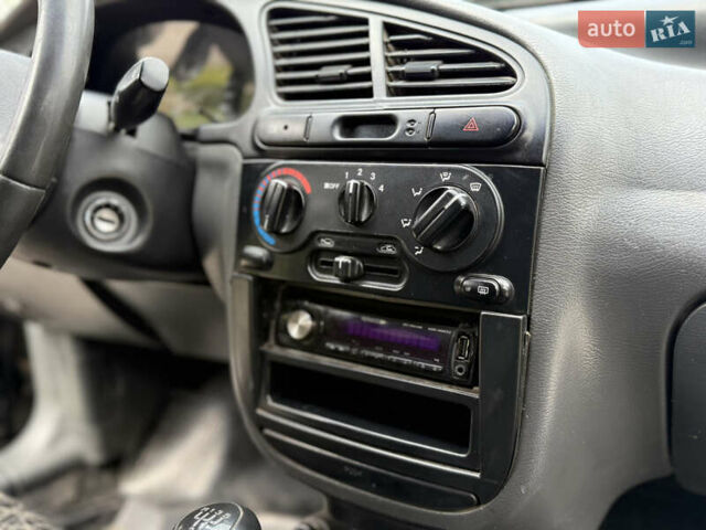 Черный Дэу Ланос, объемом двигателя 1.5 л и пробегом 170 тыс. км за 1650 $, фото 15 на Automoto.ua