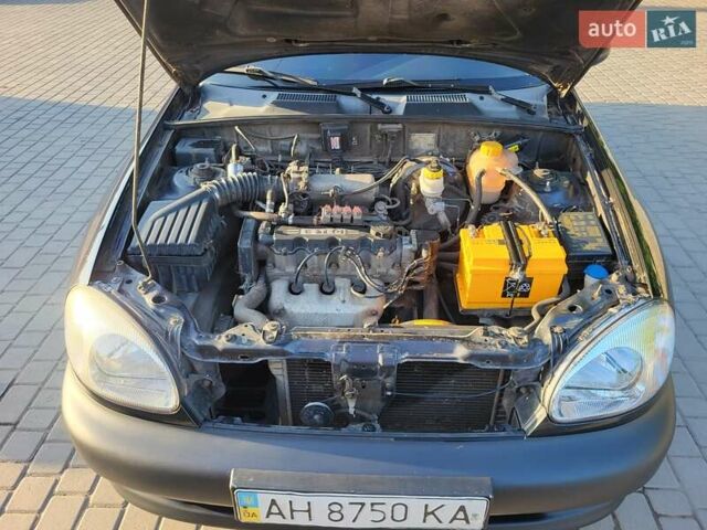 Черный Дэу Ланос, объемом двигателя 1.5 л и пробегом 215 тыс. км за 2900 $, фото 1 на Automoto.ua