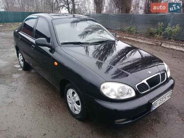 Черный Дэу Ланос, объемом двигателя 1.35 л и пробегом 122 тыс. км за 1699 $, фото 2 на Automoto.ua