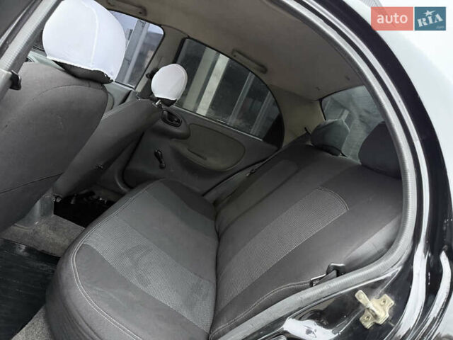 Черный Дэу Ланос, объемом двигателя 1.5 л и пробегом 251 тыс. км за 2550 $, фото 9 на Automoto.ua