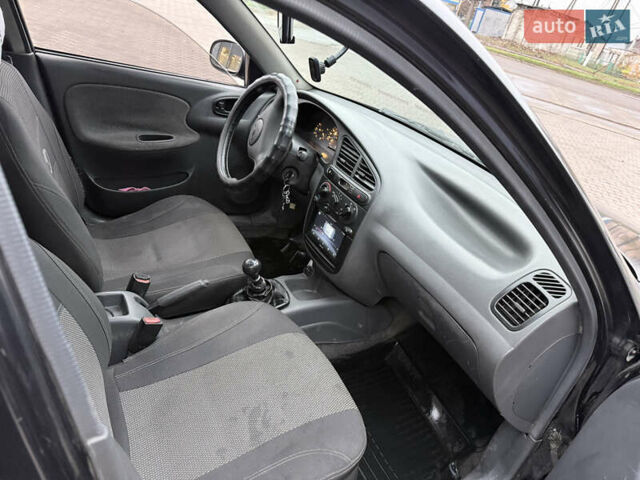 Черный Дэу Ланос, объемом двигателя 1.5 л и пробегом 251 тыс. км за 2550 $, фото 5 на Automoto.ua