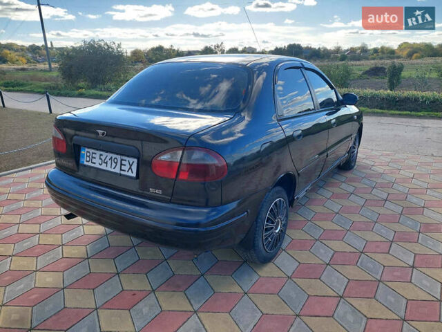 Черный Дэу Ланос, объемом двигателя 1.5 л и пробегом 226 тыс. км за 1450 $, фото 3 на Automoto.ua