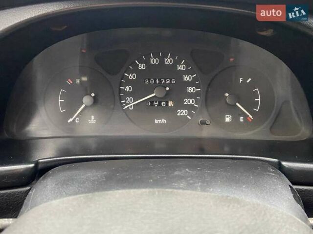 Черный Дэу Ланос, объемом двигателя 0 л и пробегом 201 тыс. км за 1500 $, фото 3 на Automoto.ua