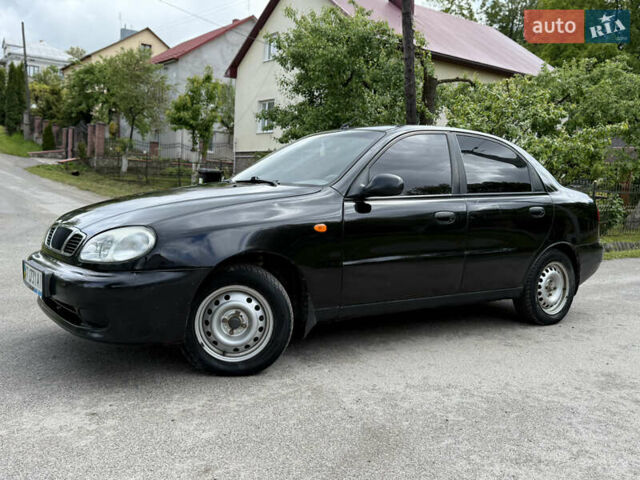 Черный Дэу Ланос, объемом двигателя 1.5 л и пробегом 170 тыс. км за 1650 $, фото 1 на Automoto.ua
