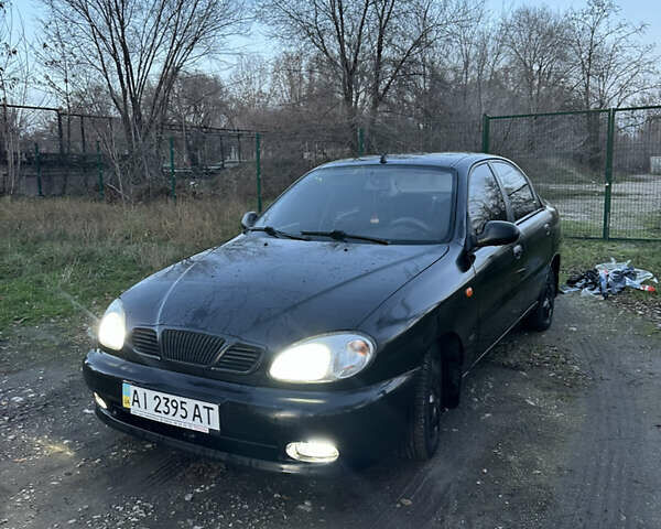 Черный Дэу Ланос, объемом двигателя 1.5 л и пробегом 270 тыс. км за 1900 $, фото 21 на Automoto.ua