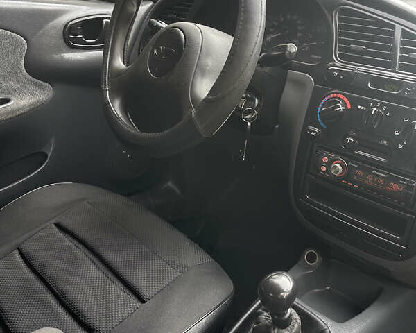 Черный Дэу Ланос, объемом двигателя 1.5 л и пробегом 198 тыс. км за 2199 $, фото 10 на Automoto.ua