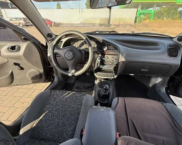 Черный Дэу Ланос, объемом двигателя 1.5 л и пробегом 163 тыс. км за 2900 $, фото 16 на Automoto.ua