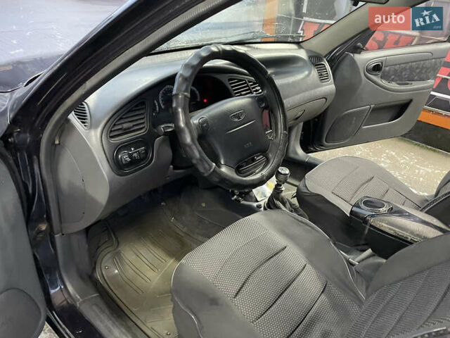 Черный Дэу Ланос, объемом двигателя 1.5 л и пробегом 145 тыс. км за 1799 $, фото 6 на Automoto.ua