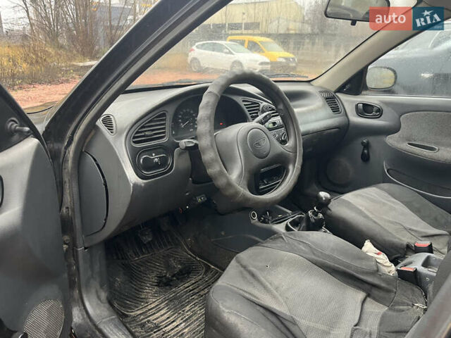 Черный Дэу Ланос, объемом двигателя 1.5 л и пробегом 296 тыс. км за 1000 $, фото 10 на Automoto.ua