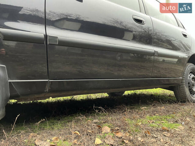 Черный Дэу Ланос, объемом двигателя 1.5 л и пробегом 140 тыс. км за 2500 $, фото 9 на Automoto.ua