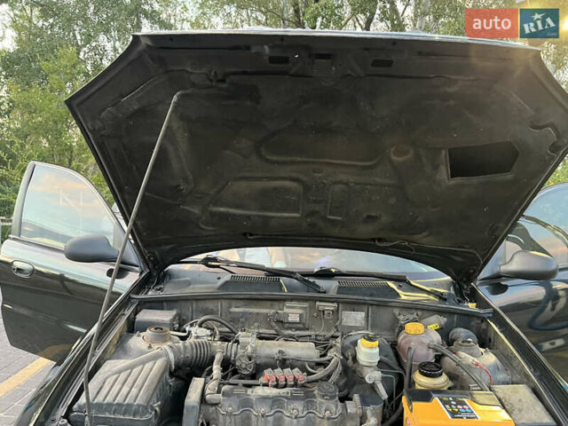 Чорний Деу Ланос, об'ємом двигуна 1.5 л та пробігом 157 тис. км за 3300 $, фото 20 на Automoto.ua