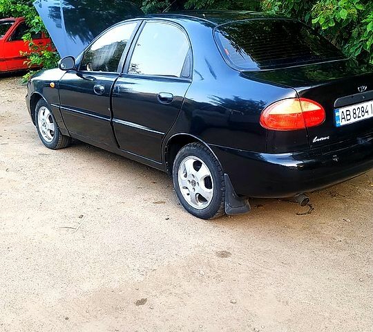 Черный Дэу Ланос, объемом двигателя 1.5 л и пробегом 230 тыс. км за 1000 $, фото 1 на Automoto.ua