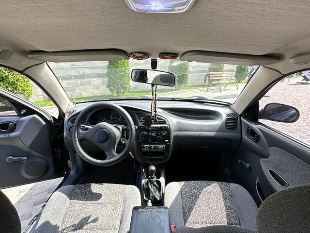 Черный Дэу Ланос, объемом двигателя 1.5 л и пробегом 176 тыс. км за 2899 $, фото 8 на Automoto.ua