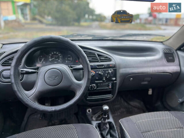 Дэу Ланос 2007 в Краматорске на Automoto.ua Черный Дэу Ланос, объемом двигателя 1.5 л и пробегом 150 тыс. км за 2100 $, фото 7 на Automoto.ua