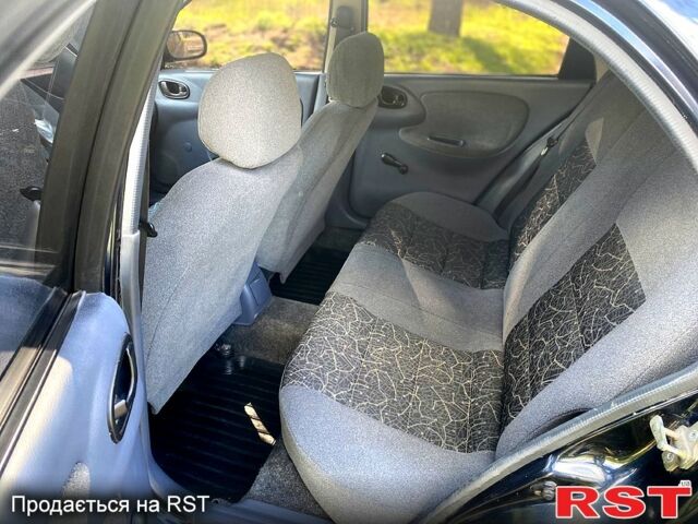 Чорний Деу Ланос, об'ємом двигуна 1.5 л та пробігом 311 тис. км за 2500 $, фото 12 на Automoto.ua