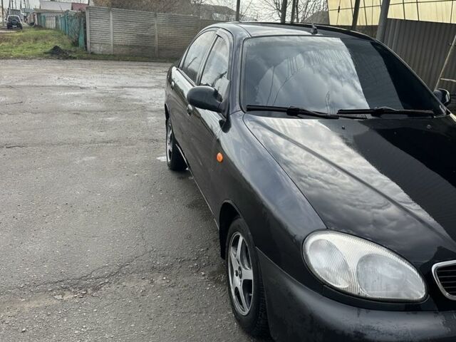 Черный Дэу Ланос, объемом двигателя 1.5 л и пробегом 150 тыс. км за 1700 $, фото 6 на Automoto.ua