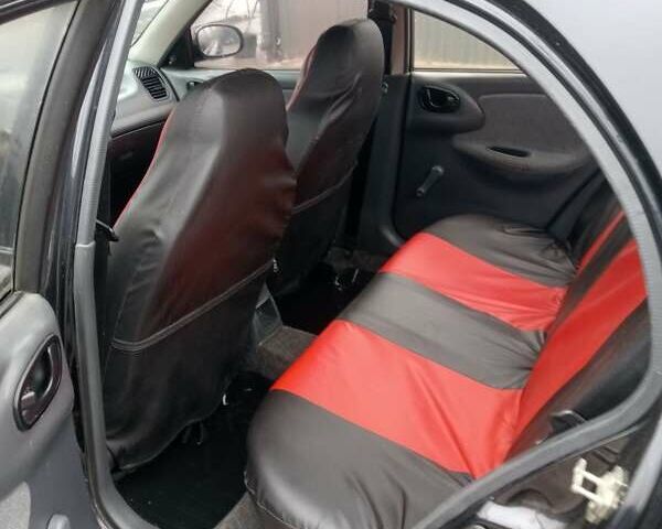 Черный Дэу Ланос, объемом двигателя 1.5 л и пробегом 224 тыс. км за 1499 $, фото 20 на Automoto.ua