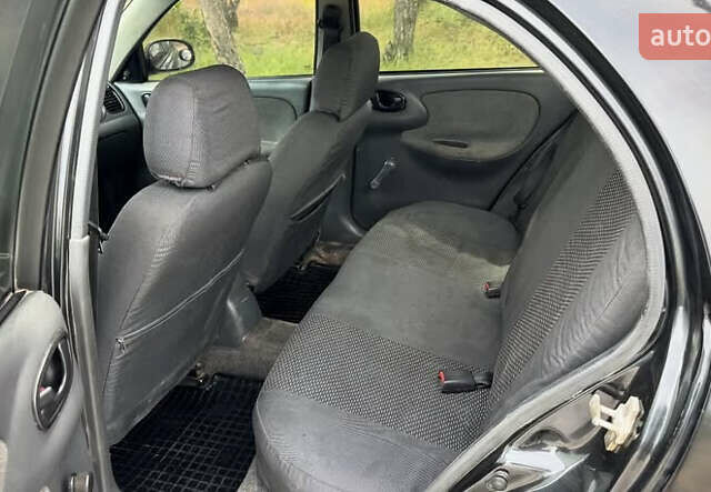 Черный Дэу Ланос, объемом двигателя 1.5 л и пробегом 233 тыс. км за 2200 $, фото 6 на Automoto.ua