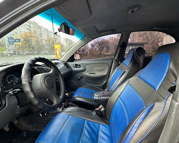 Чорний Деу Ланос, об'ємом двигуна 1.5 л та пробігом 181 тис. км за 1888 $, фото 8 на Automoto.ua