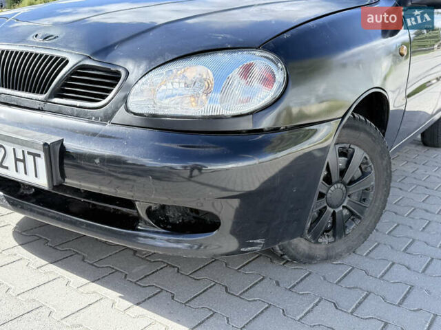 Черный Дэу Ланос, объемом двигателя 1.5 л и пробегом 190 тыс. км за 1550 $, фото 1 на Automoto.ua