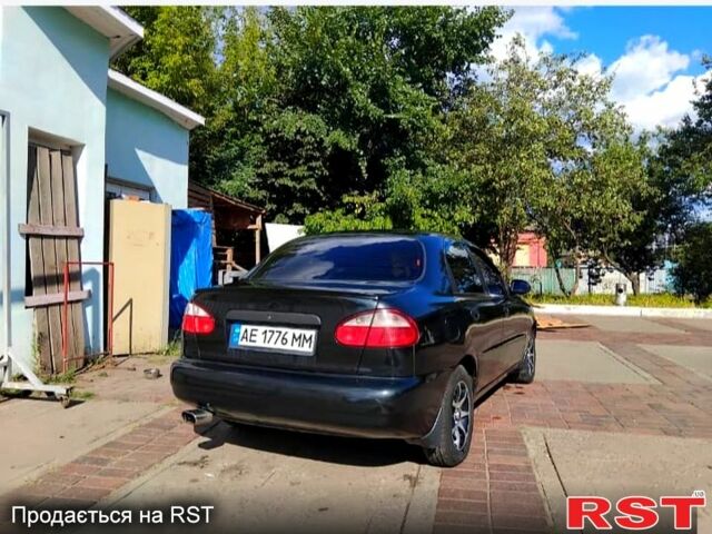 Черный Дэу Ланос, объемом двигателя 1.4 л и пробегом 222 тыс. км за 2100 $, фото 2 на Automoto.ua