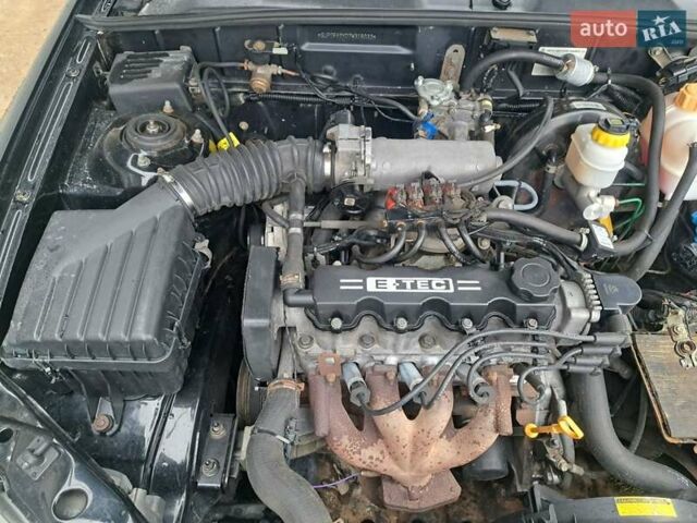 Черный Дэу Ланос, объемом двигателя 1.5 л и пробегом 158 тыс. км за 1250 $, фото 19 на Automoto.ua