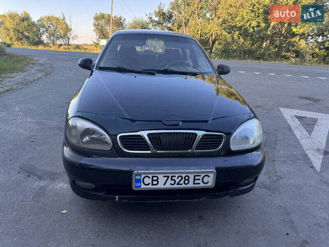 Чорний Деу Ланос, об'ємом двигуна 1.5 л та пробігом 200 тис. км за 1350 $, фото 23 на Automoto.ua