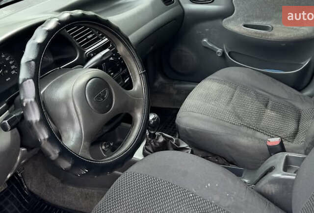 Черный Дэу Ланос, объемом двигателя 1.5 л и пробегом 233 тыс. км за 2200 $, фото 7 на Automoto.ua