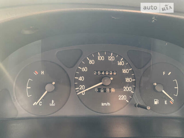 Черный Дэу Ланос, объемом двигателя 1.5 л и пробегом 280 тыс. км за 1300 $, фото 6 на Automoto.ua