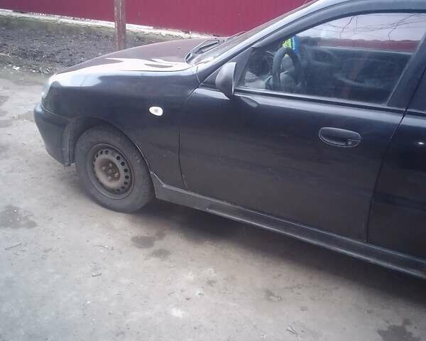 Черный Дэу Ланос, объемом двигателя 1.5 л и пробегом 275 тыс. км за 1690 $, фото 1 на Automoto.ua