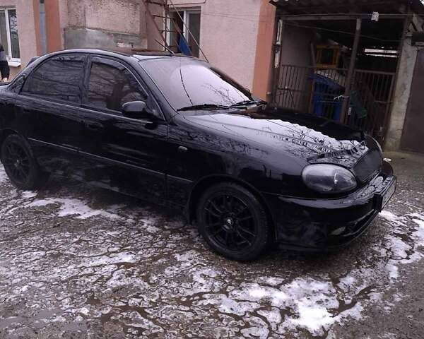 Чорний Деу Ланос, об'ємом двигуна 1.6 л та пробігом 63 тис. км за 4200 $, фото 1 на Automoto.ua