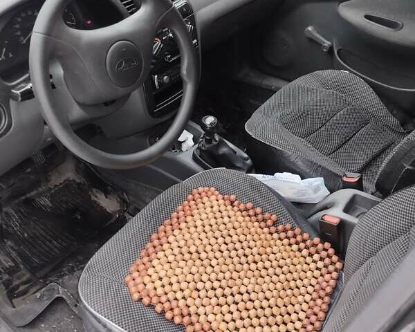 Черный Дэу Ланос, объемом двигателя 1.5 л и пробегом 145 тыс. км за 1200 $, фото 5 на Automoto.ua