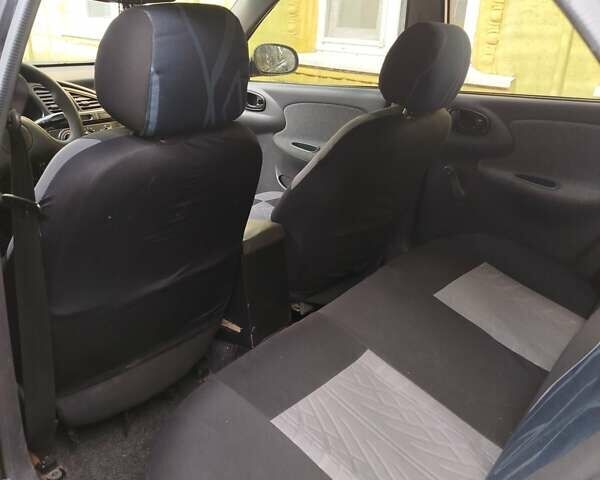 Черный Дэу Ланос, объемом двигателя 1.5 л и пробегом 270 тыс. км за 2850 $, фото 5 на Automoto.ua